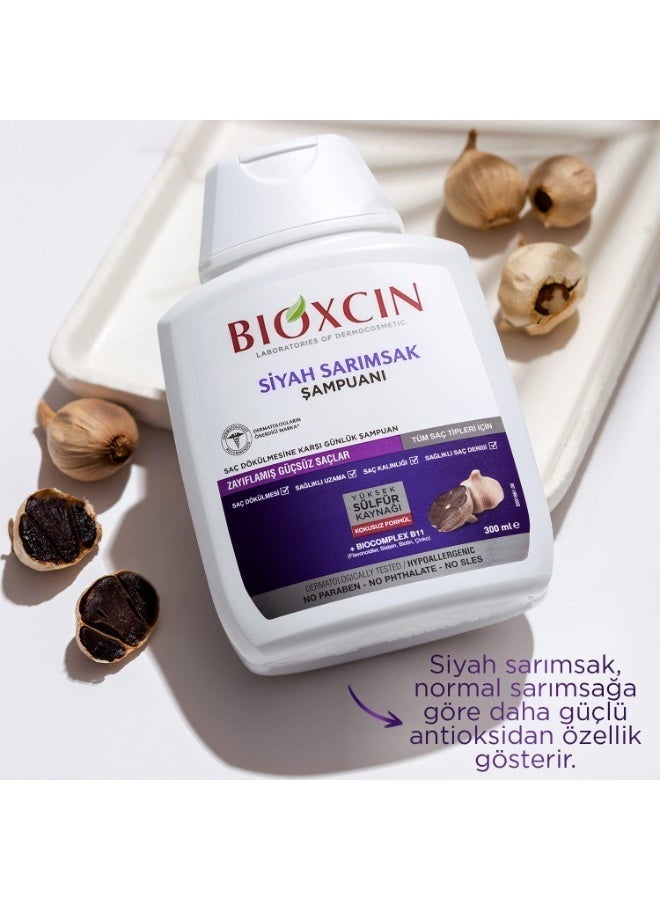 بيوكسين شامبو بيوكسين العشبي المضاد لتساقط الشعر بالثوم الأسود: يقوي الشعر ويزيد من كثافته (300 مل) - Image 1